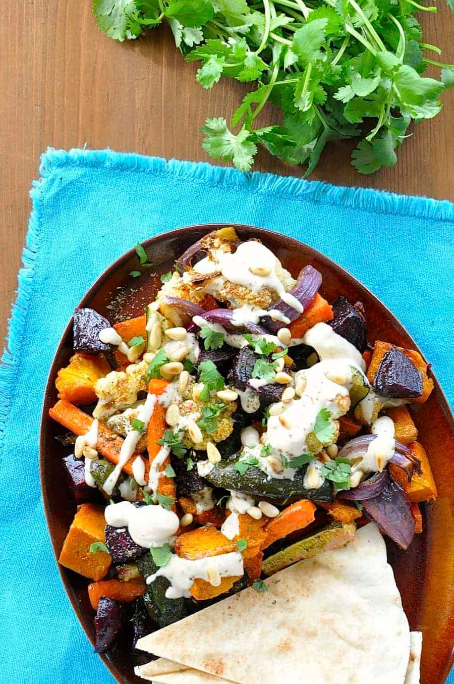 Middle Eastern Roasted Vegetables with Tahini Sauce {Vegan} - great way to use up leftover veggies, insanely simple, fabulous sauce!