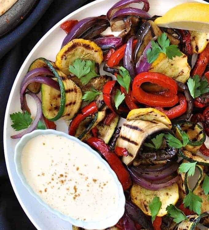 Grilled Vegetables Platter, a simple starter or vegetarian meal, on a white plate ready for serving.
