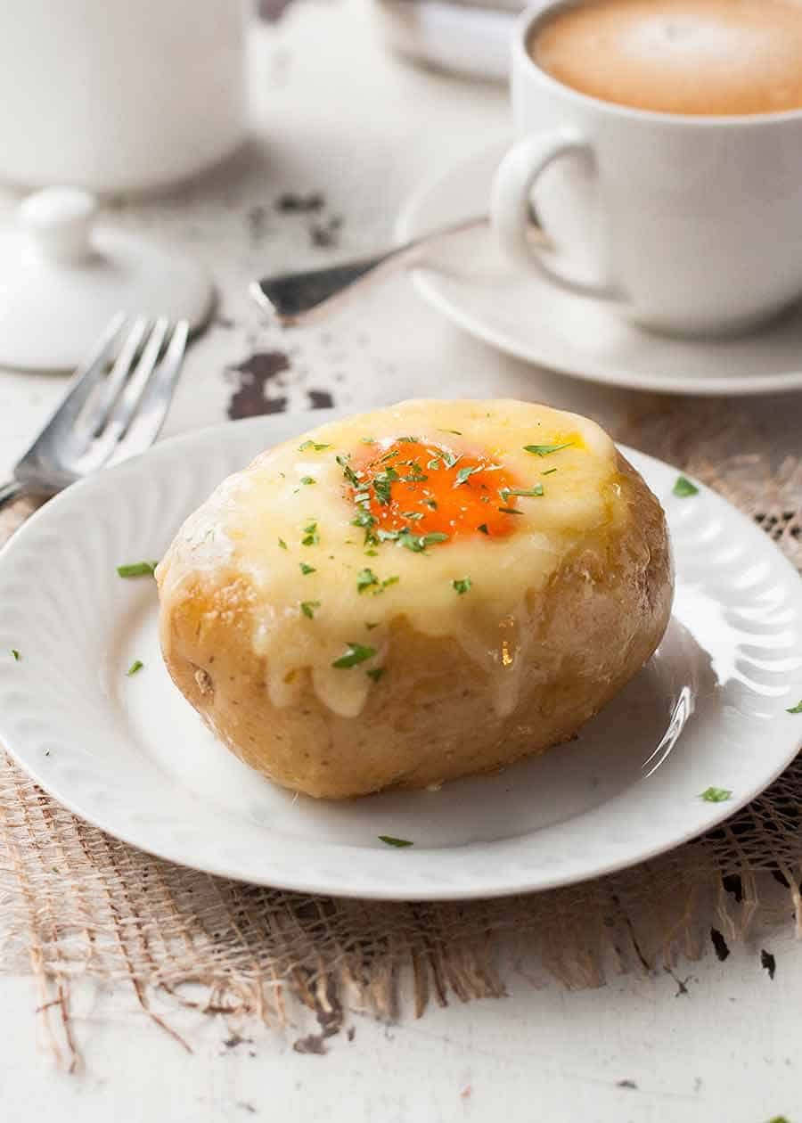 Sausage Egg Stuffed Potatoes on a plate, ready to be eaten