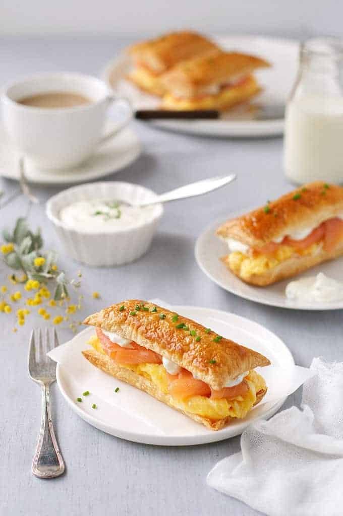 Breakfast table with Smoked Salmon and Egg Breakfast Mille-feuille and a cup of coffee