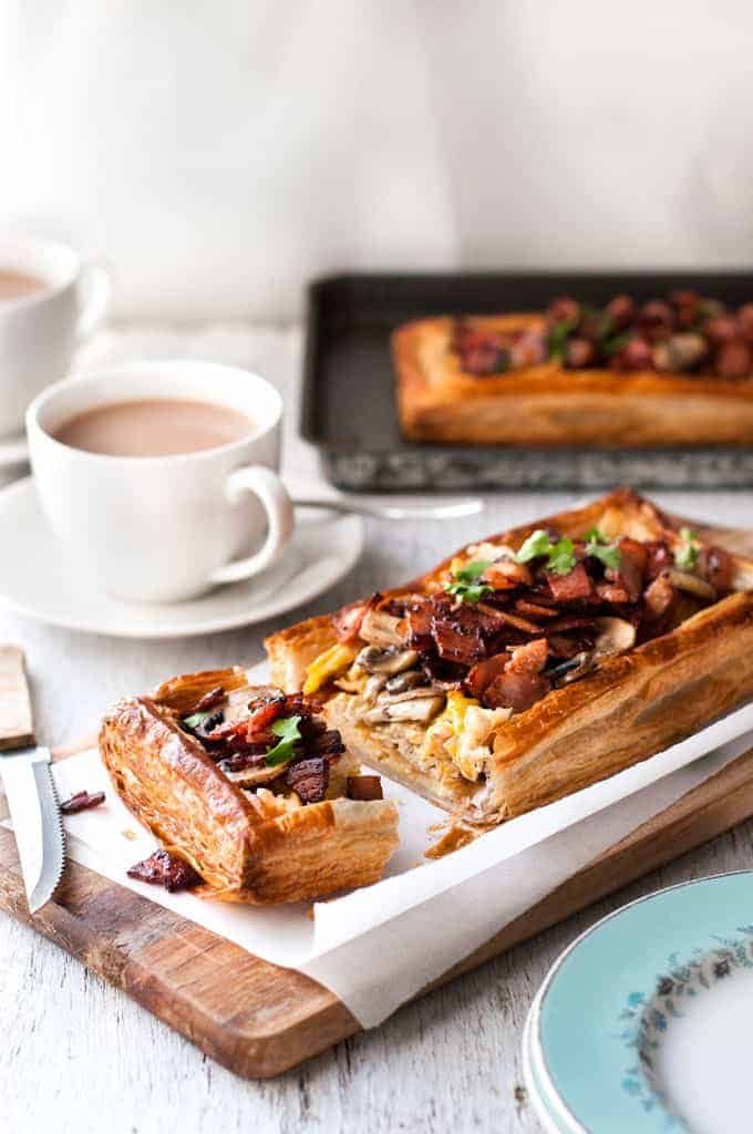 Bacon, Egg and Mushroom Tart on a wooden board