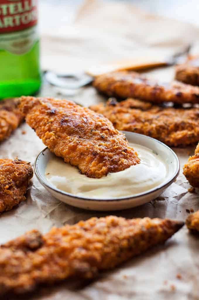 Oven Fried Chicken Tenders - tastes just like KFC, with a crunchy coating, 11 Secret Herbs & Spices and a fraction of the calories! recipetineats.com