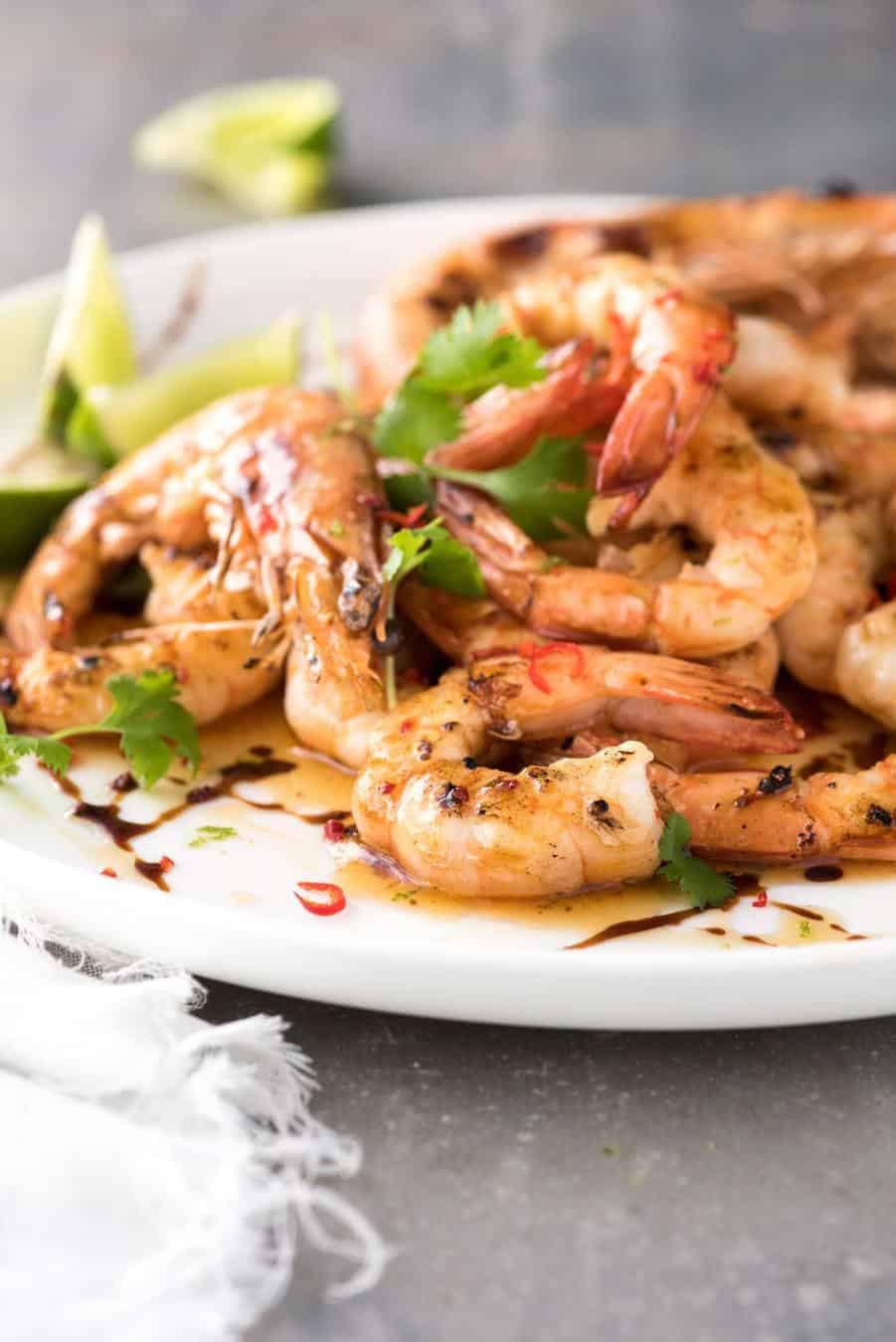 Close up of Asian Grilled Shrimp on a white plate.