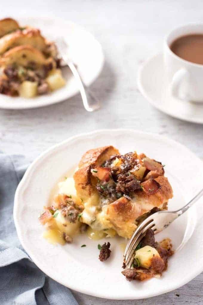 Sausage and Bacon Country Breakfast Casserole on a serving plate, ready to be eaten.