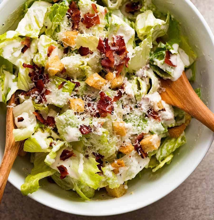 Caesar Salad in a white bowl, ready to be served