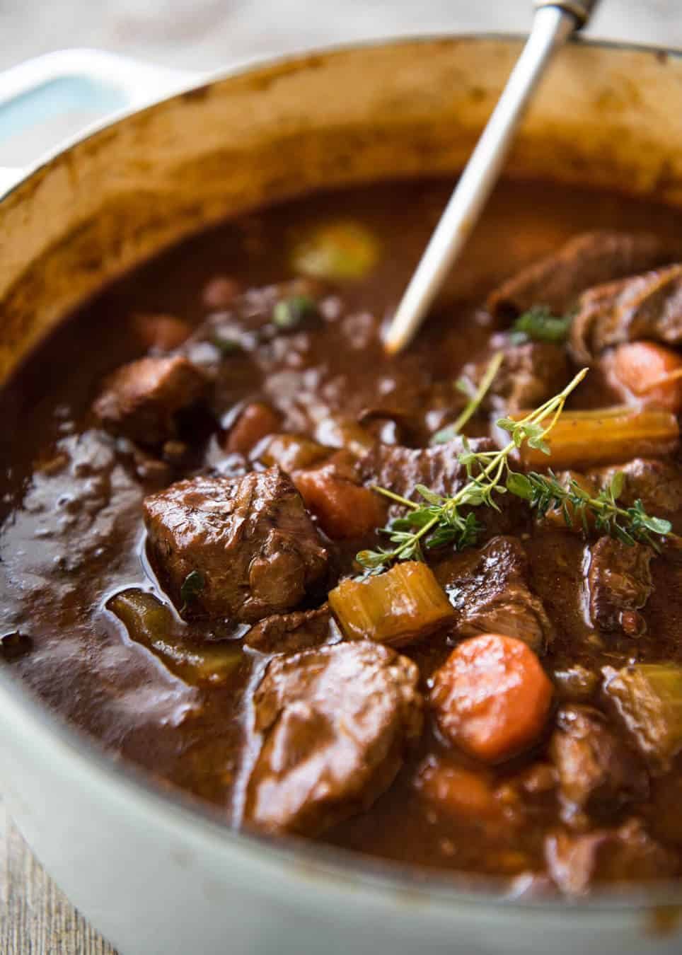 Irish Beef and Guinness Stew - The king of all stews! Fork tender beef in a rich thick sauce. Easy to make, just requires patience! Slow cooker, stove, oven and pressure cooker directions provided. www.recipetineats.com