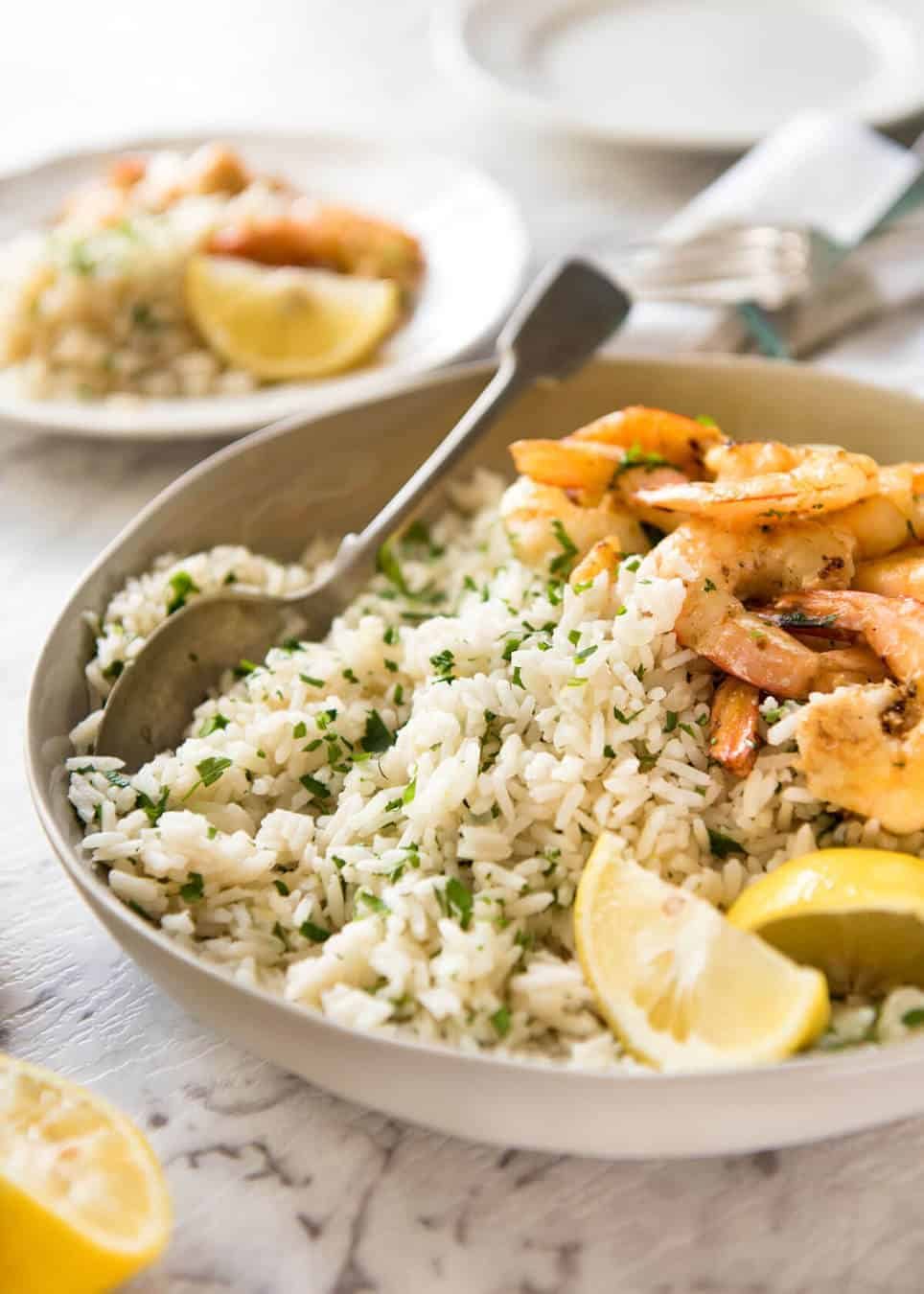 This Lemon Rice Pilaf is so delicious, it can be eaten plain! Lovely bright fresh lemon flavours with herbs. www.recipetineats.com