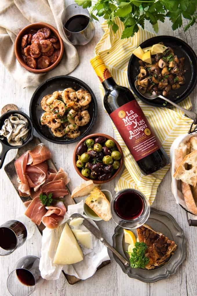 5 Easy Spanish Tapas recipes - all your favorites from the tapas bar! Garlic mushrooms, chorizo, garlic shrimp/prawns, Spanish marinated olives , Spanish omelette and a cheese platter! www.recipetineats.com