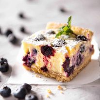 These Blueberry Cheesecake Bars are light yet creamy and luscious. Filled with soft blueberries, this is a baked cheesecake that's so easy to make! recipetineats.com