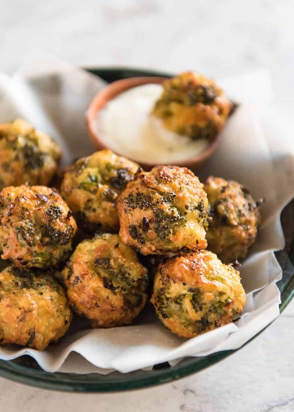 Baked Broccoli Cheese Balls - outrageously delicious as a meal or bites to serve at a gathering! Served with a Yoghurt Lemon Sauce. recipetineats.com