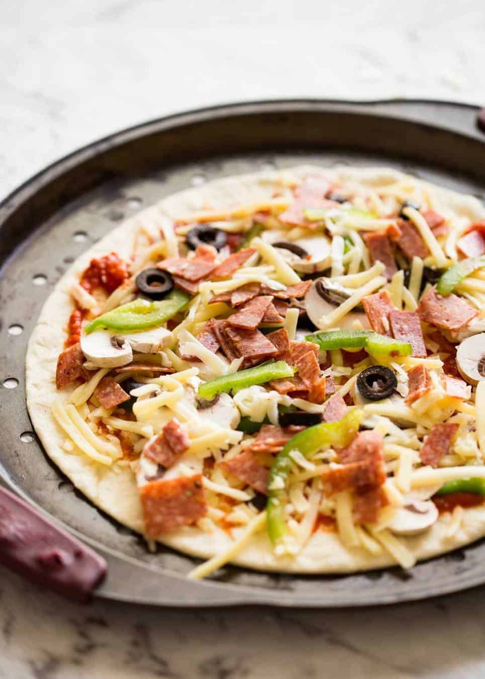 How to bake Crispy Base Pizza using Flatbread www.recipetineats.com