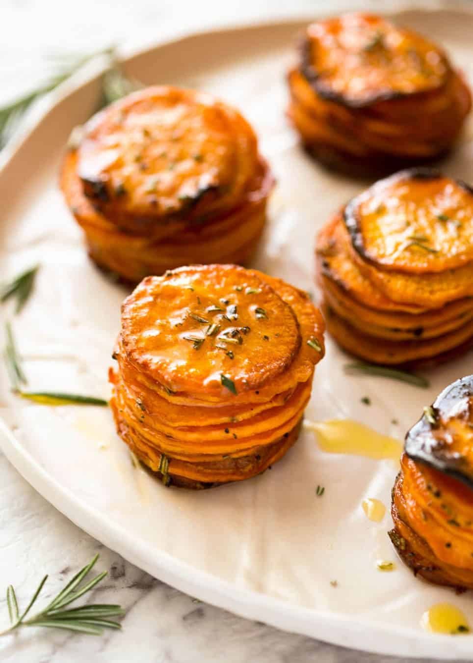 These Roasted Sweet Potato Stacks have crispy edges, are buttery, salty and sweet with a hint of rosemary. Terrific Sweet Potato side dish! recipetineats.com