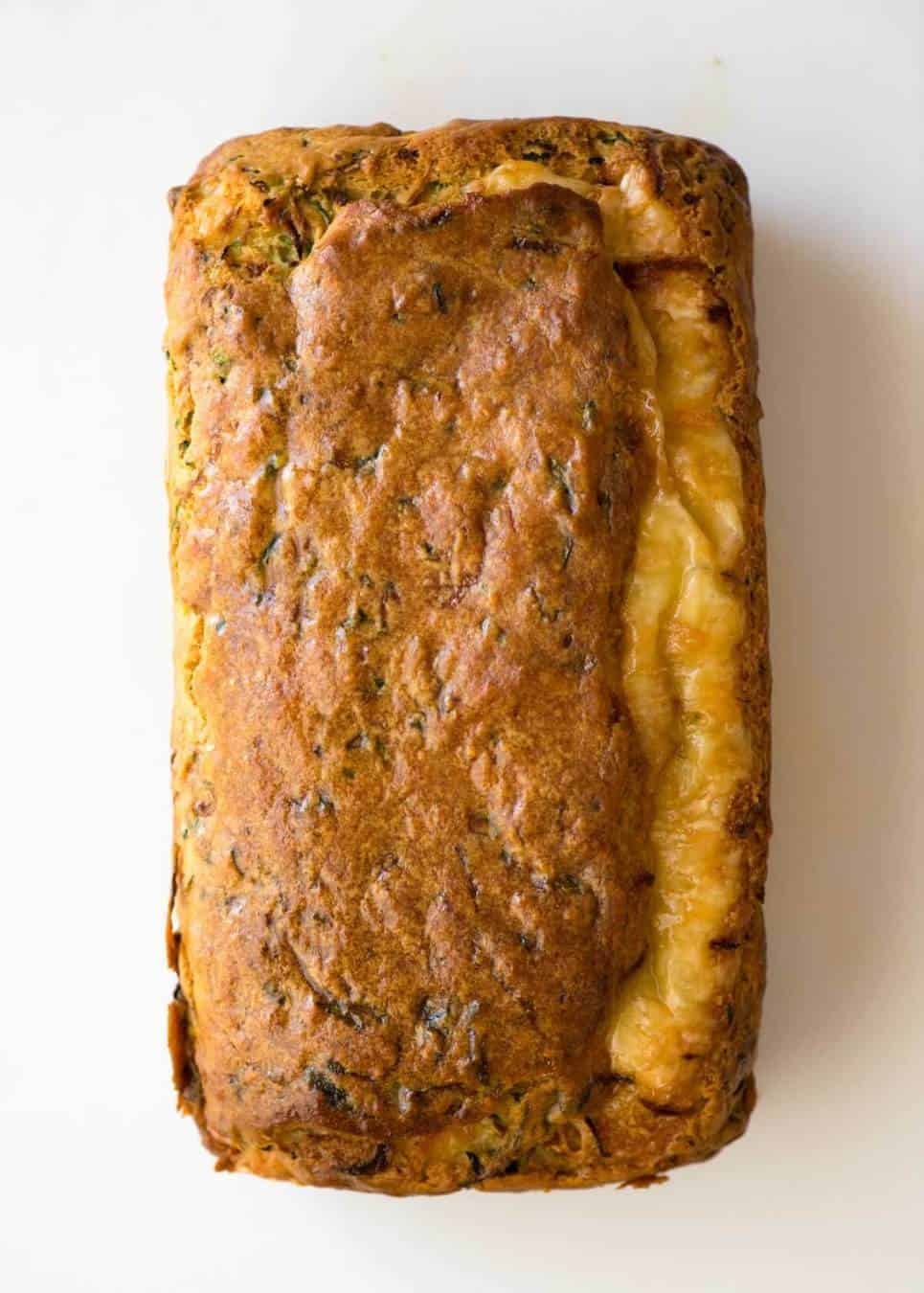 A Cheesy Zucchini Bread that's quick to make (no yeast) and is so moist, you'll scoff it down even without slathering it with butter! www.recipetineats.com