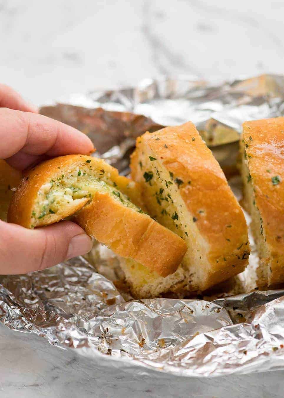 Better than Pizza Hut! For a truly religious Garlic Bread experience, skip the artisan bread and use a basic French stick. And no skimping on butter! www.recipetineats.com