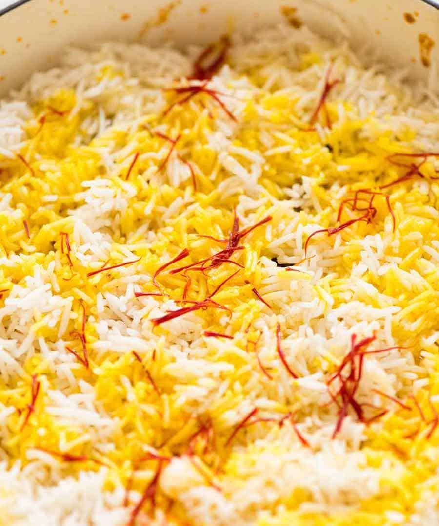 Chicken Biryani in a white Chasseur cast iron pot, fresh off the stove