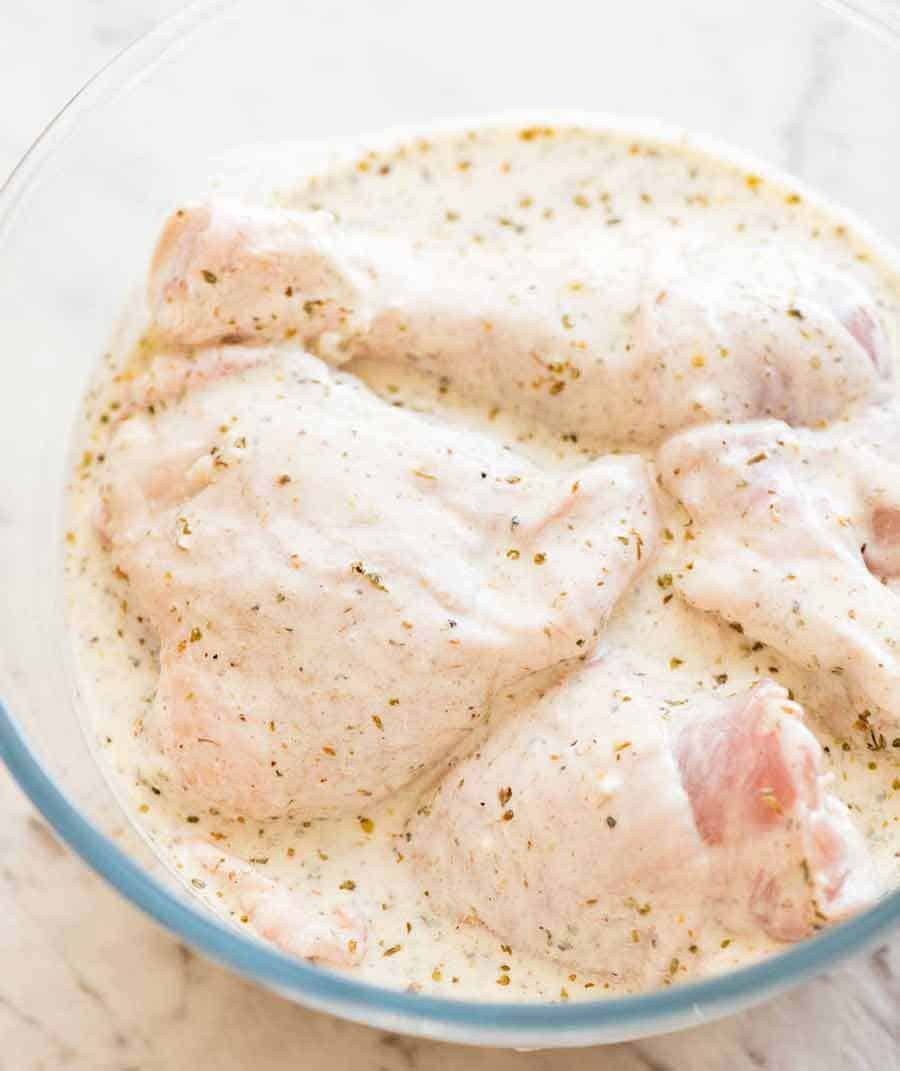 Chicken in a bowl with a Greek Yogurt Marinade