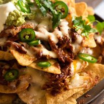 Close up of Chicken Nachos made tin Doritos corn chips
