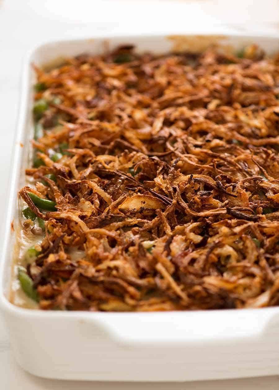 Green Bean Casserole covered with crispy fried onions, fresh out of the oven