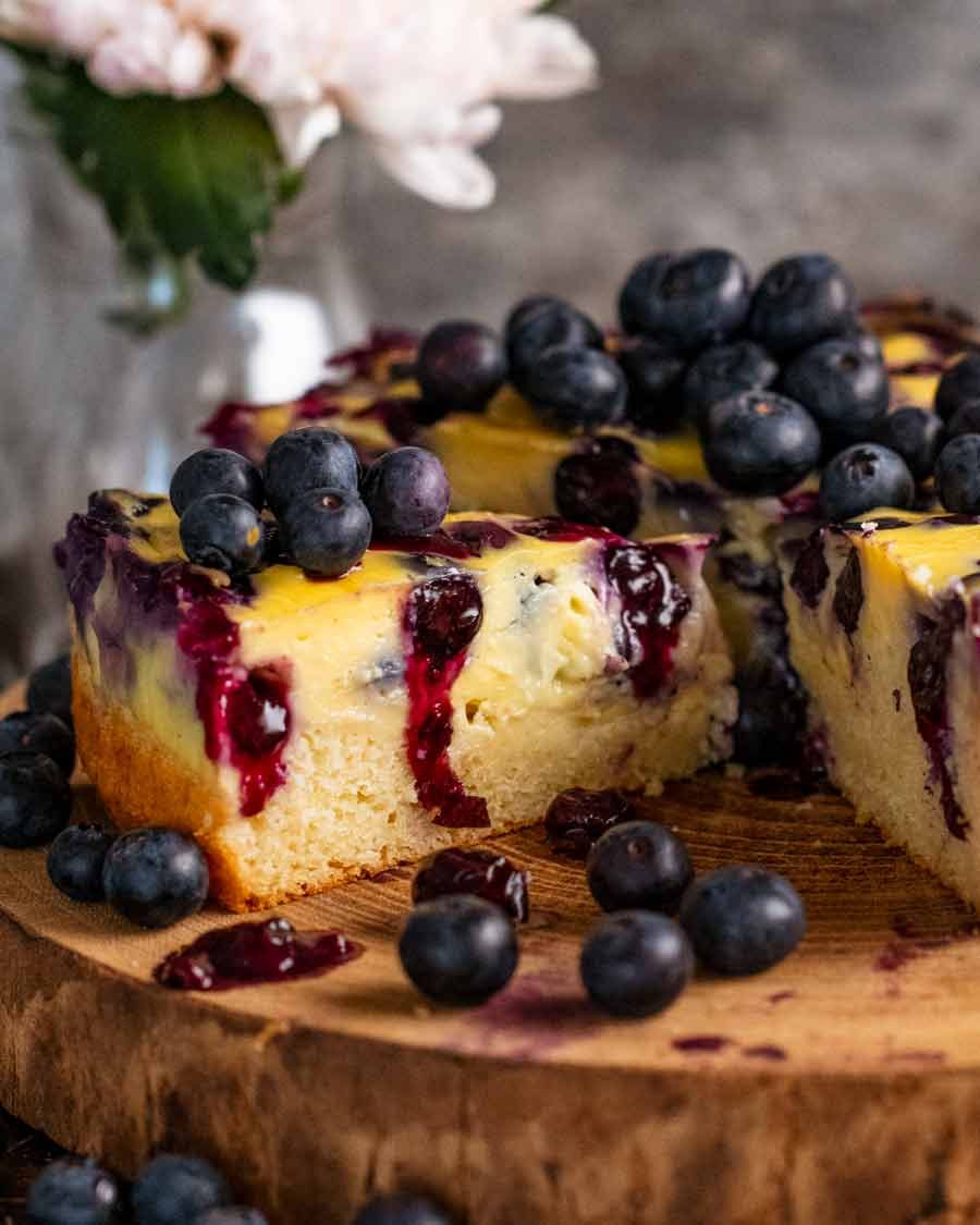 Close up of a slice of Blueberry Custard Cake